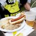 A German Picnic patron carries a tray of food on Saturday, June 29. Daniel Brenner I AnnArbor.com